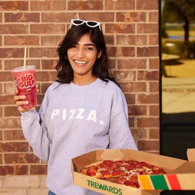 PHOTO: A 7-Eleven customer holds a pizza and a Big Gulp.