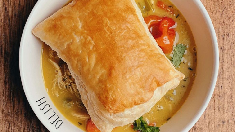 Curry chicken pot pie with puff pastry topping.