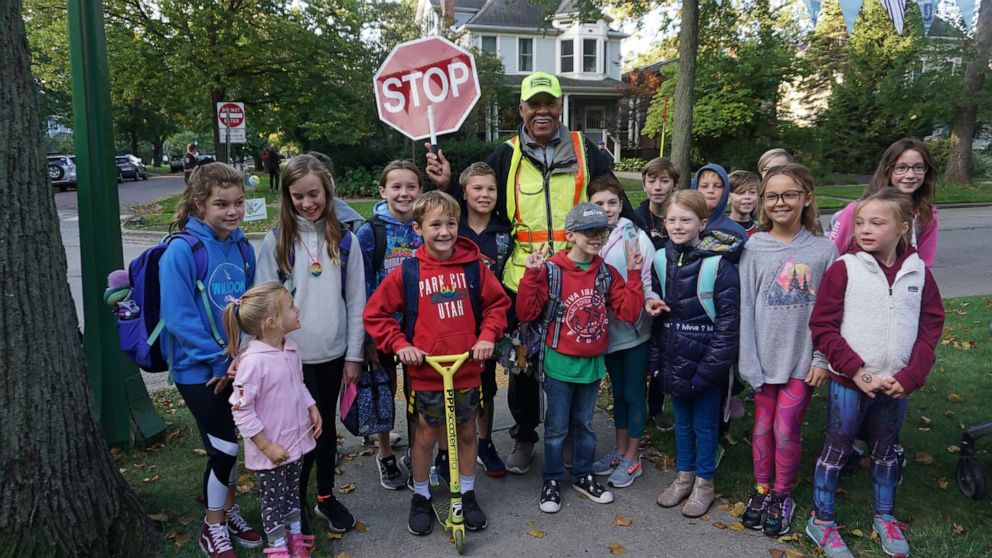 PHOTO: On Sept. 10, 2019, Alec Childress was met with 100 kids, parents, family and church members at the intersection where he's been crossing students in Wilmette, Illinois, for 14 years.
