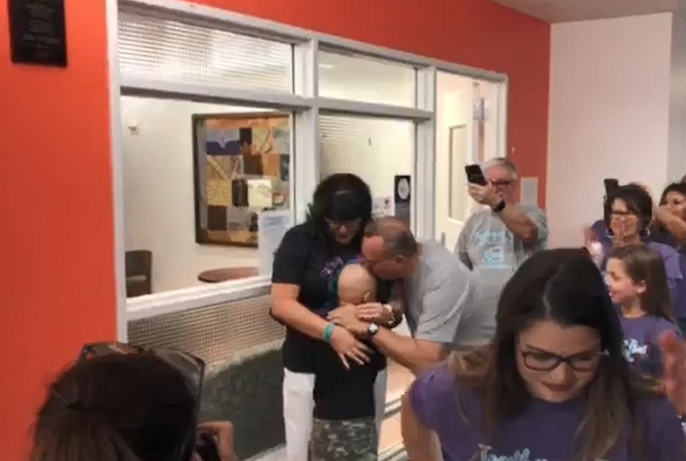 PHOTO: After doctors gave her a clean bill of health, Kaylee Tolleson, 9, joyfully rang a bell signifying she was cancer-free. 