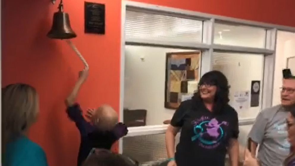 PHOTO: Kaylee Tolleson, 9, ran through a crowd of loved ones at Texas Children's Hospital and rang a bell to celebrate being declared cancer-free after a bout with ovarian cancer.