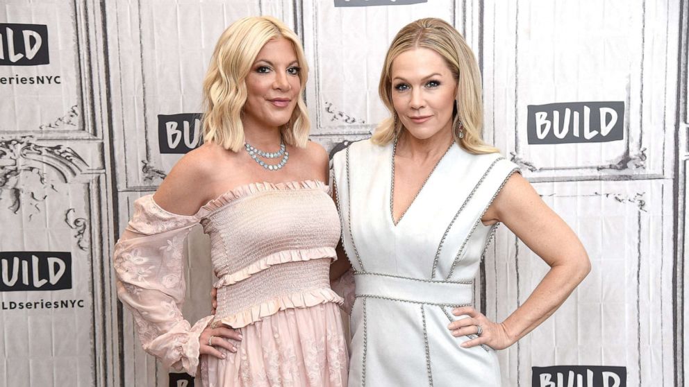 PHOTO: Tori Spelling and Jennie Garth visit the Build Series, Aug. 5, 2019, in New York.