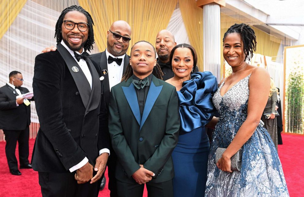 PHOTO: Texas teen Deandre Arnold (C) poses with filmmakers of "Hair Love" at the 92nd Oscars at the Dolby Theatre in Hollywood, California on February 9, 2020. 