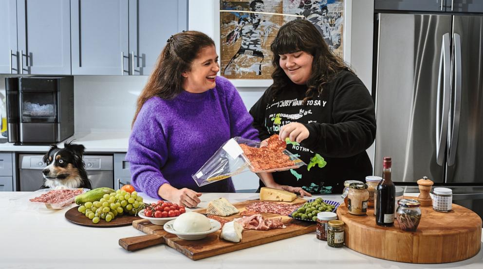 PHOTO: Alex Guarnaschelli in the kitchen with her daughter Ava Clark.