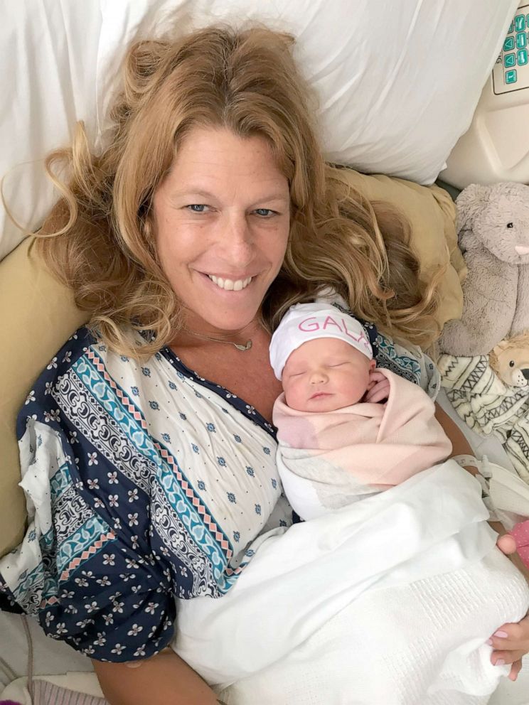 PHOTO: Abbey LeVine poses with her newborn daughter Gala in September 2019.
