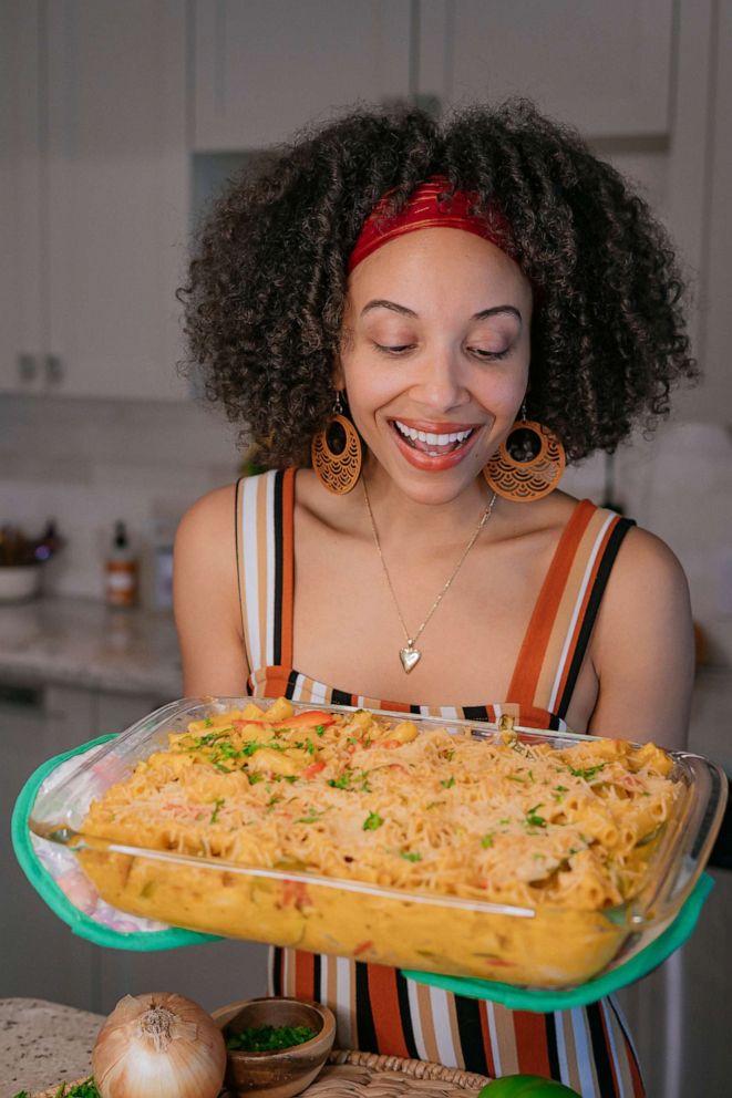 PHOTO: Gabrielle Reyes holds a pan of Haitian mac and cheese.