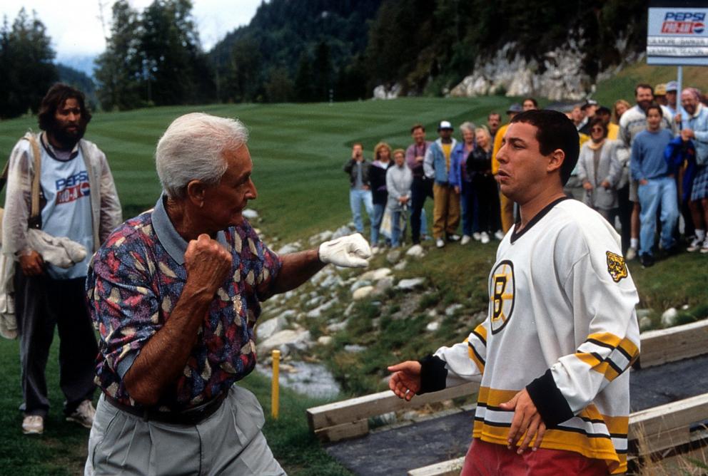 PHOTO: Bob Barker prepares to punch Adam Sandler in a scene from the film 'Happy Gilmore', 1996. 