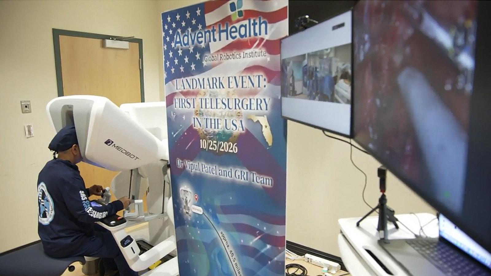 PHOTO: Dr. Vipul Patel, medical director of the Global Robotics Institute at AdventHealth, performs a surgery using a robotic telesurgery system.