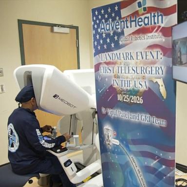 PHOTO: Dr. Vipul Patel, medical director of the Global Robotics Institute at AdventHealth, performs a surgery using a robotic telesurgery system.
