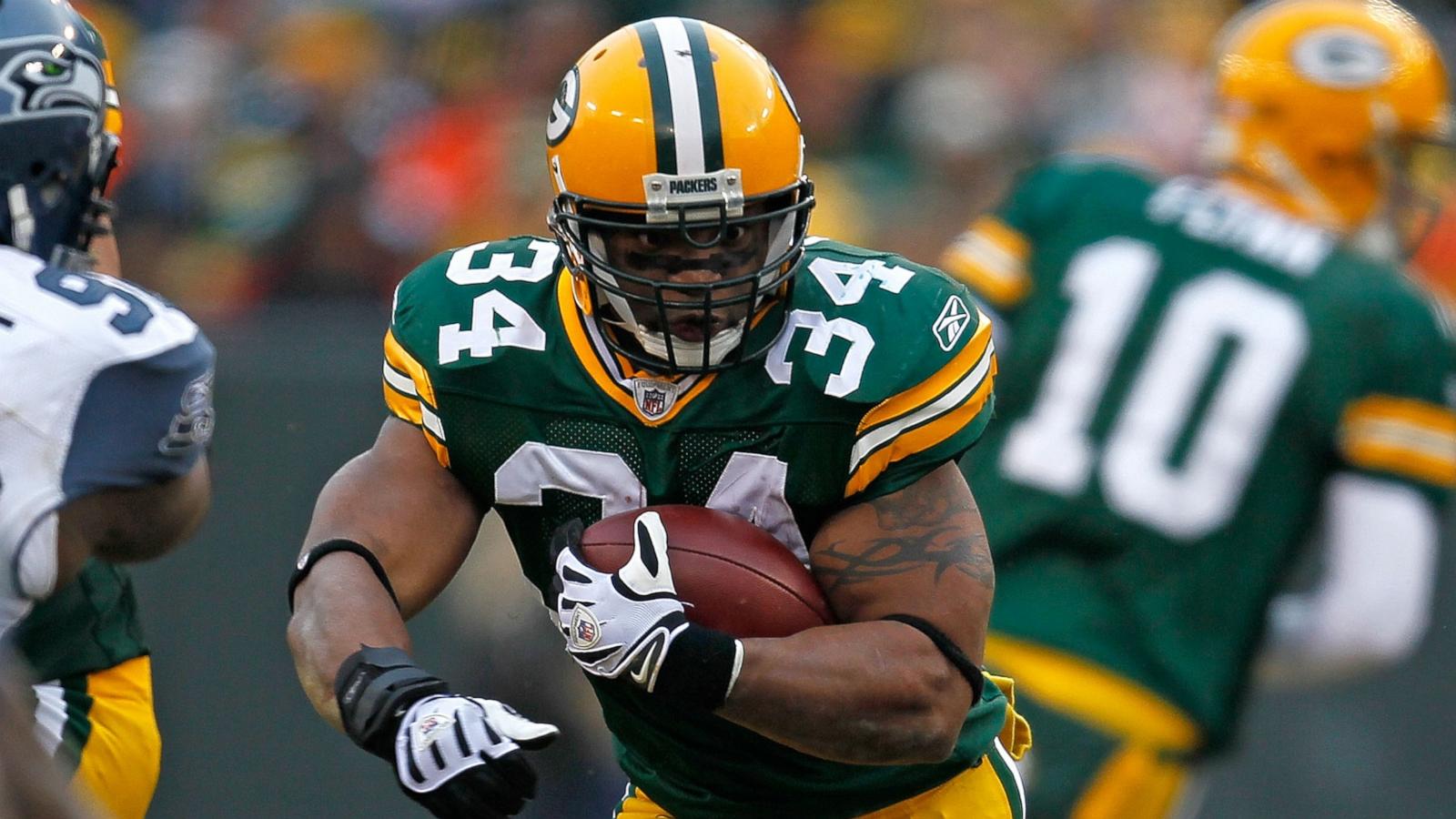PHOTO: Ahman Green of the Green Bay Packers runs for yardage against the Seattle Seahawks, December 27, 2009 in Green Bay, Wisconsin.