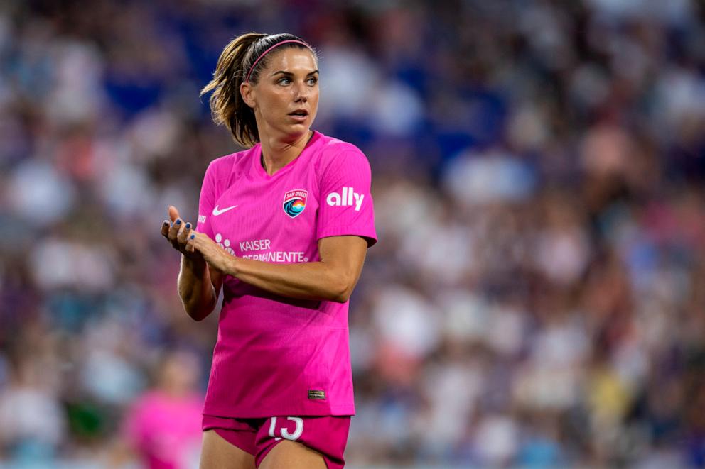 PHOTO: Alex Morgan #13 of San Diego Wave FC claps for teammate effort in the second half of the National Women's Soccer League match against the NJ/NY Gotham FC at Red Bull Arena on June 19, 2024 in Harrison, N.J.