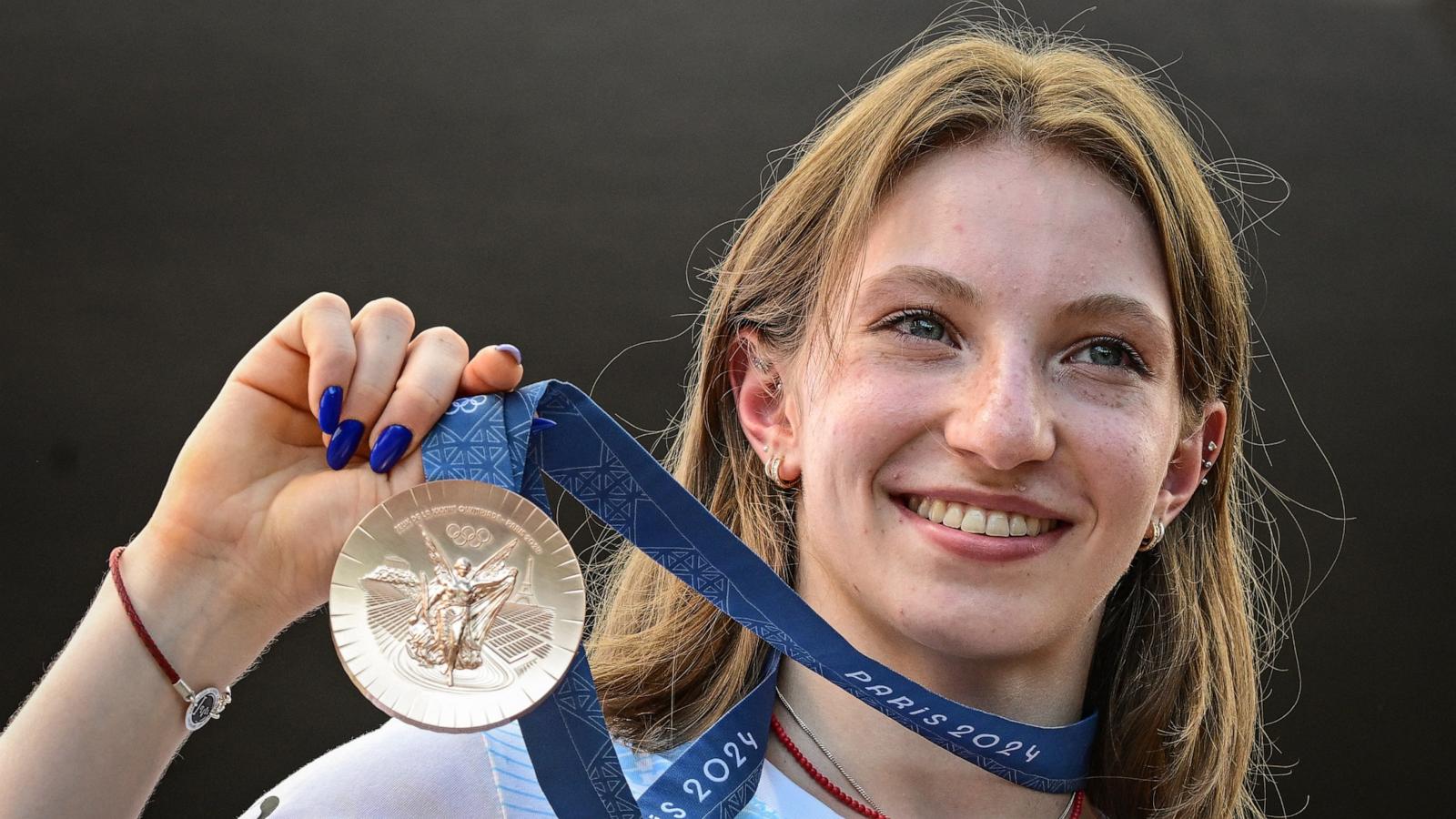 PHOTO: Romanian gymnast Ana Maria Barbosu poses with her Olympic bronze medal she was given, Aug. 16, 2024, in Bucharest, Romania.