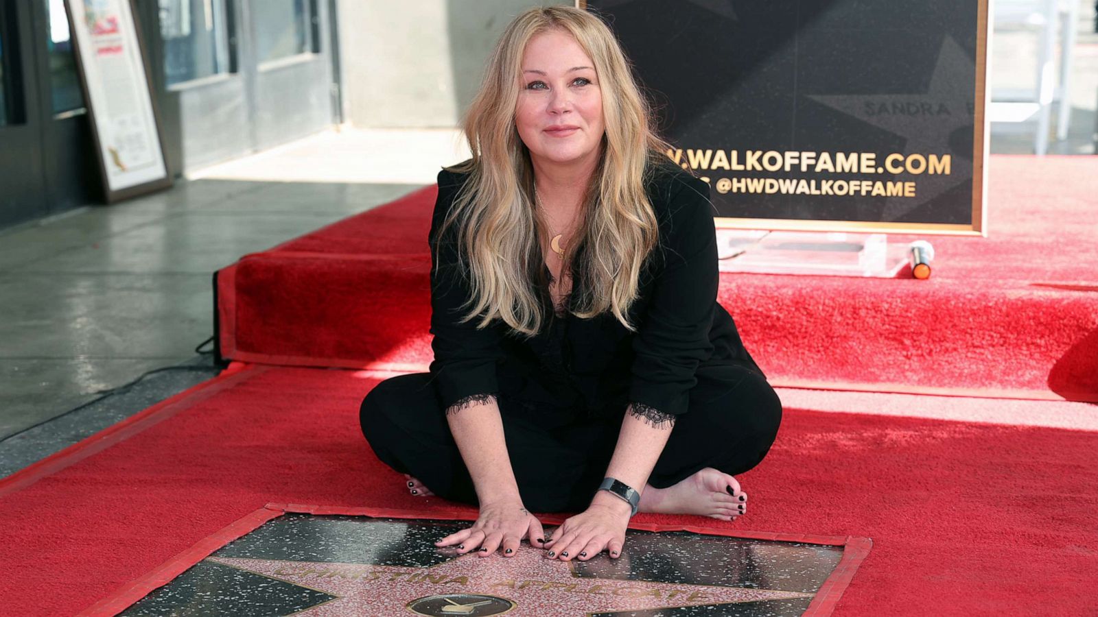 PHOTO: Christina Applegate poses with her star during her Hollywood Walk of Fame Ceremony at Hollywood Walk Of Fame, Nov. 14, 2022, in Los Angeles.