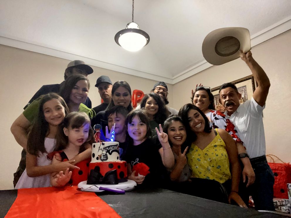 PHOTO: Alicia Aragonez, in yellow shirt, poses with her family members in Arlington, Texas, at a gathering prior to start of the coronavirus pandemic.