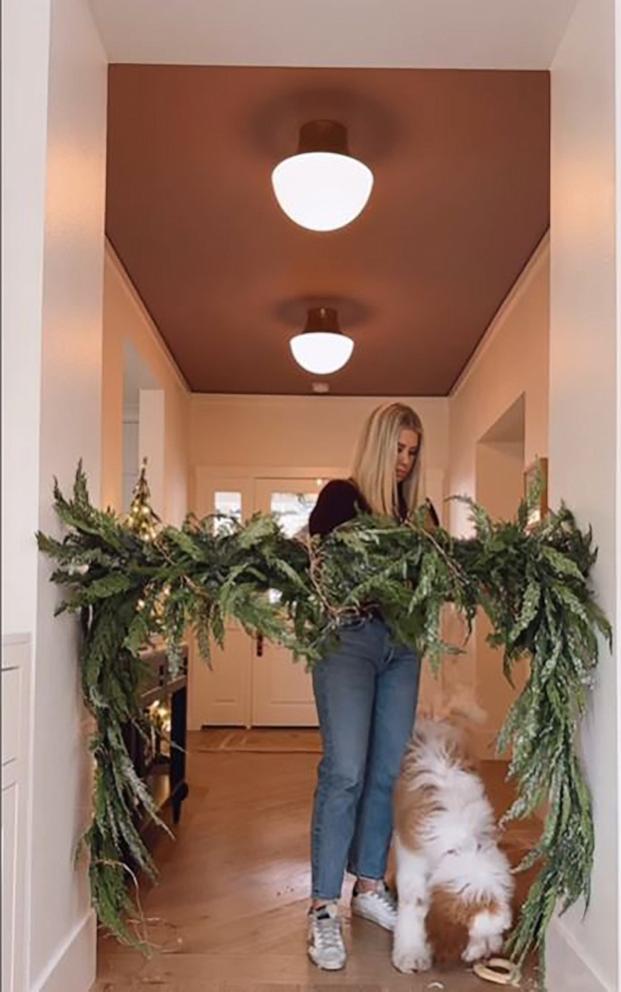 PHOTO: Ashley Stringfellow, founder of Modern Glam, tried the viral garland shower rod hack.