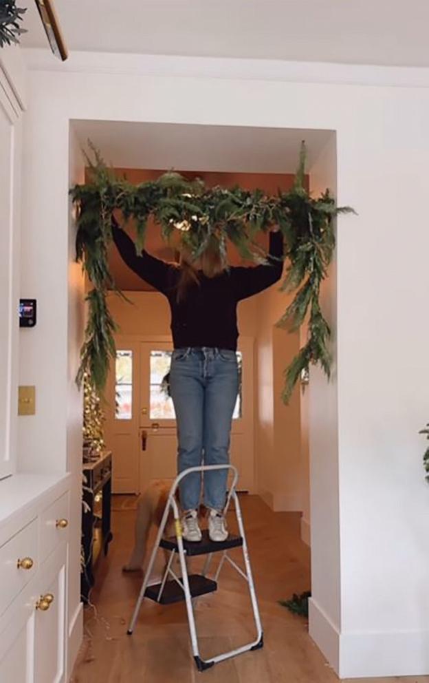 PHOTO: Ashley Stringfellow, founder of Modern Glam, tried the viral garland shower rod hack.