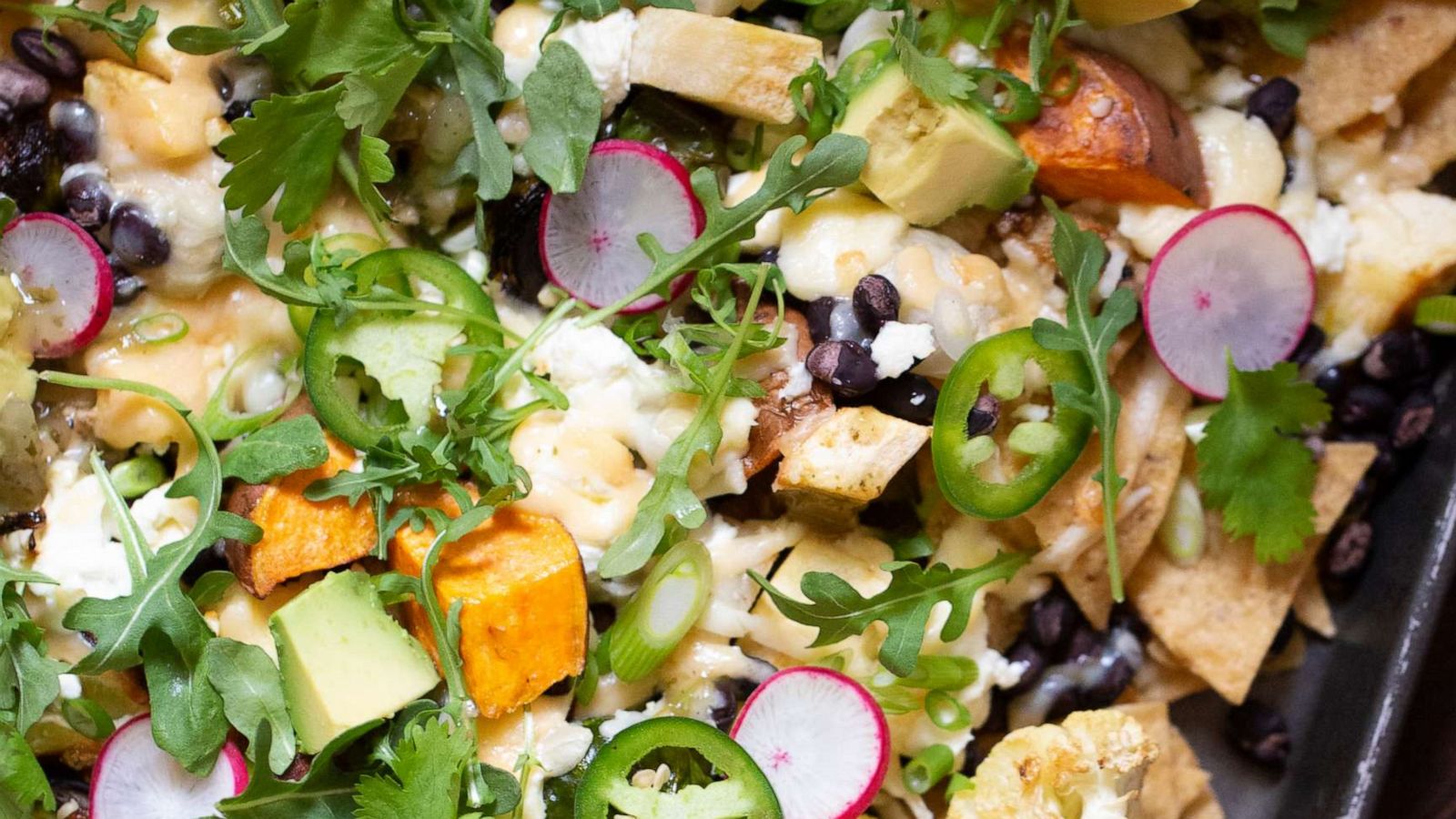 PHOTO: Veggie nachos made on a sheet tray.