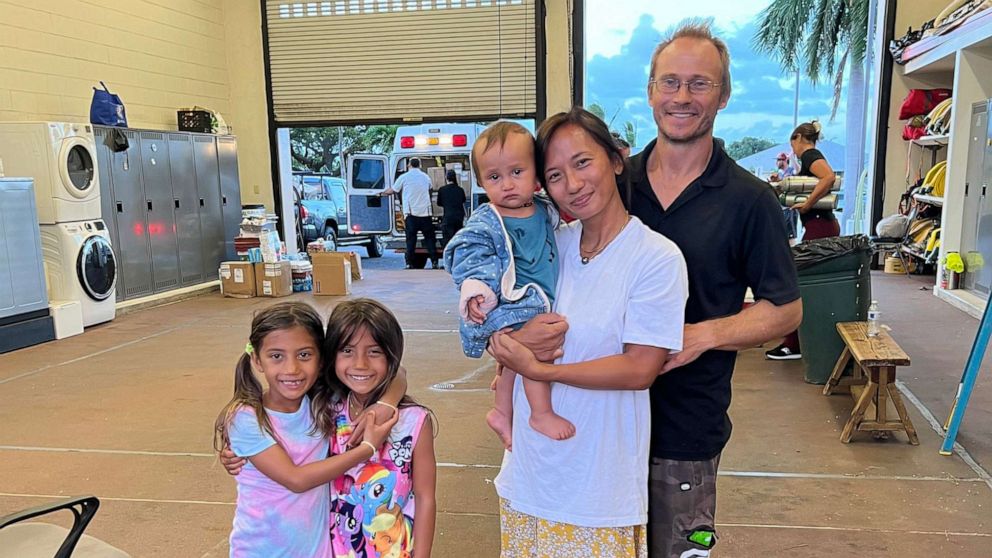 PHOTO: Aubrey Vailoces is pictured with her three children and her partner at a fire station in Maui after their home was destroyed by wildfires.