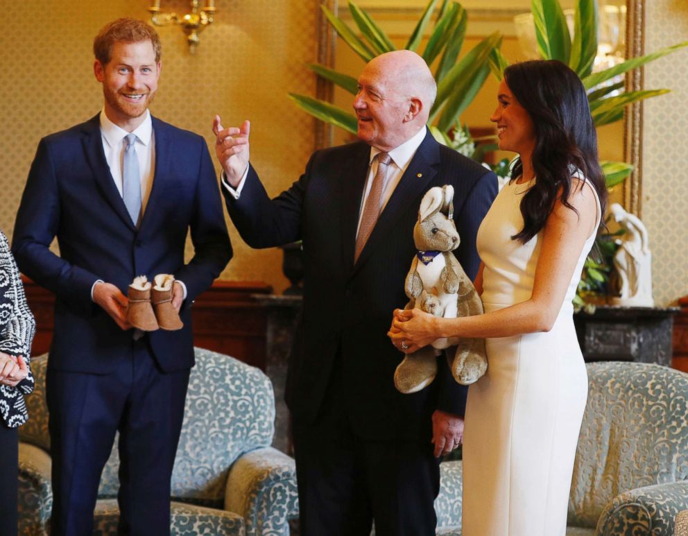 PHOTO: Australia's Governor General Peter Cosgrove gives the Duke and Duchess of Sussex a toy kangaroo, with a baby, at Admiralty House in Sydney on the first day of the royal couple's visit to Australia, Oct. 16, 2018.