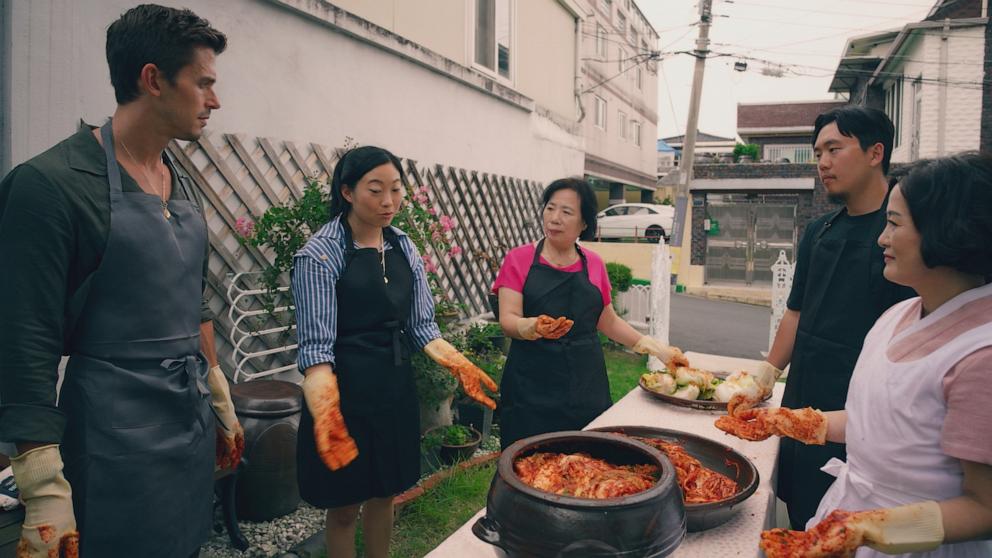 PHOTO:Antoni Porowski and Awkwafina with Insook Kim, Junho Lee and Shin Aga to make Kimchi.