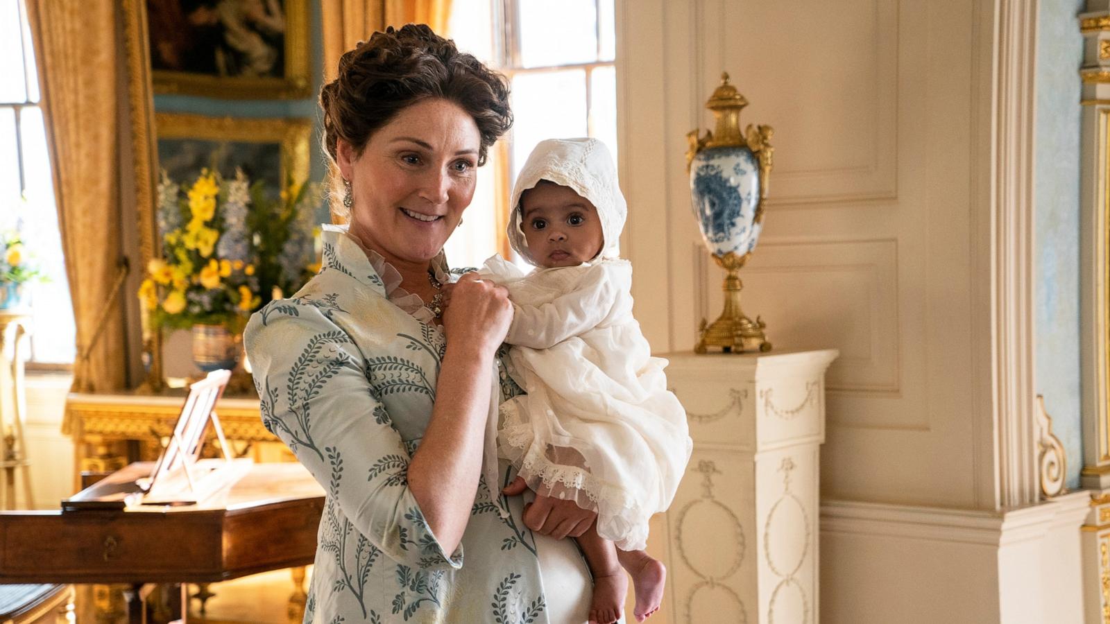 PHOTO: Ruth Gemmell as Lady Violet Bridgerton, Arianna and Ava Gittens-Roberts as Baby Augie in episode 203 of "Bridgerton."
