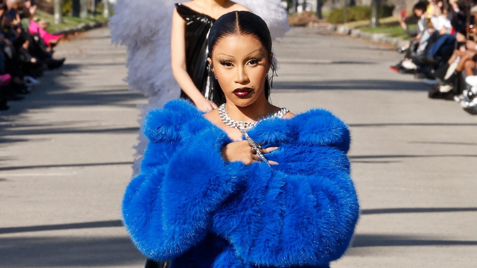 PHOTO: Cardi B walks the runway down South Windsor Boulevard during the Balenciaga Fall 2024 fashion show on Dec. 2, 2023 in Los Angeles.