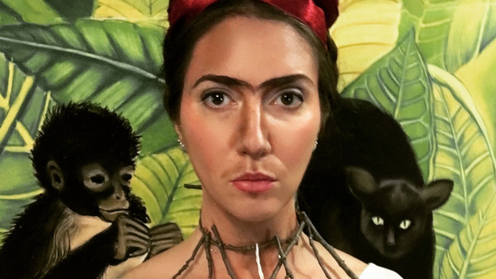 PHOTO: Jennifer De Angelo-Baxter dressed up as Frida Kahlo’s “Self-Portrait with Thorn Necklace and Hummingbird.”