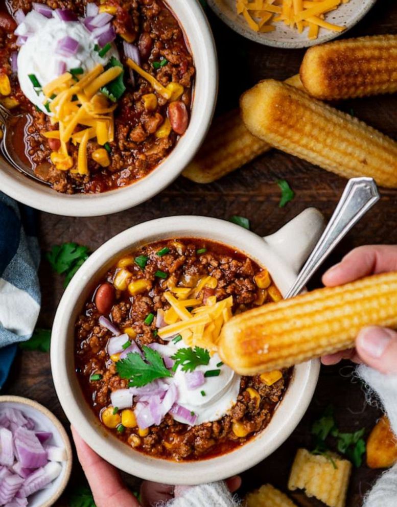 PHOTO: Bowls of beef chili topped with sour cream, red onions and shredded cheese.