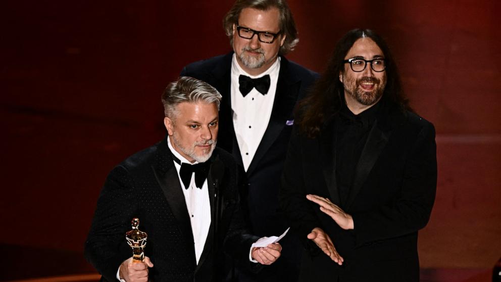 PHOTO: Dave Mullins, Brad Booker, and Sean Ono Lennon accept the award for Best Animated Short Film for "War is Over! Inspired by the Music of John & Yoko" during the 96th Annual Academy Awards in Hollywood, CA, March 10, 2024. 