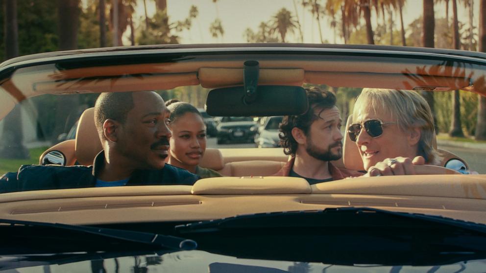 PHOTO: Eddie Murphy as Axel Foley, Taylour Paige as Jane Saunders, Joseph Gordon-Levitt as Detective Bobby Abbott, and Bronson Pinchot as Serge in Beverly Hills Cop: Axel F.