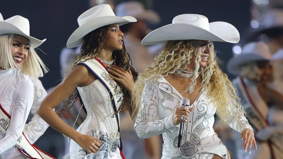 PHOTO: Beyonce performs with her daughter Blue Ivy during the halftime show of an NFL football game between the Houston Texans and the Baltimore Ravens, Dec. 25, 2024, in Houston.