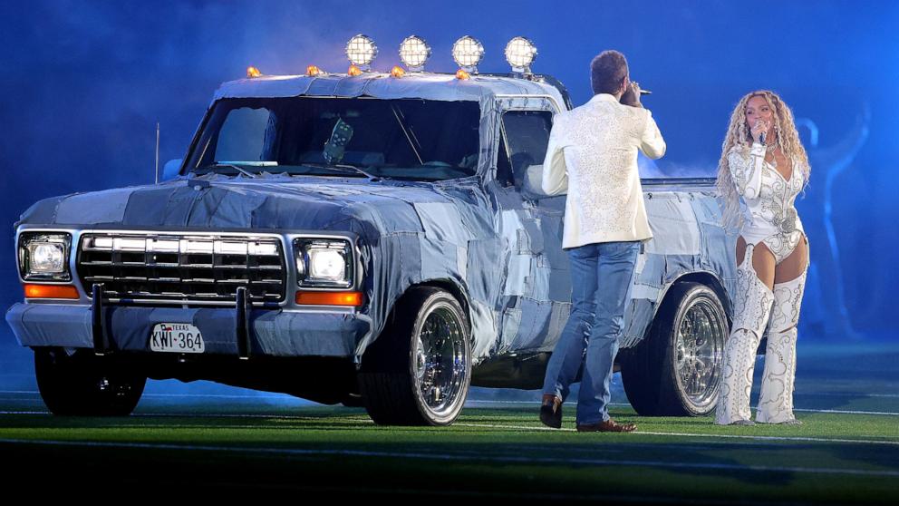 PHOTO: Beyonce performs with Post Malone during the halftime show of an NFL football game between the Houston Texans and the Baltimore Ravens, Dec. 25, 2024, in Houston.