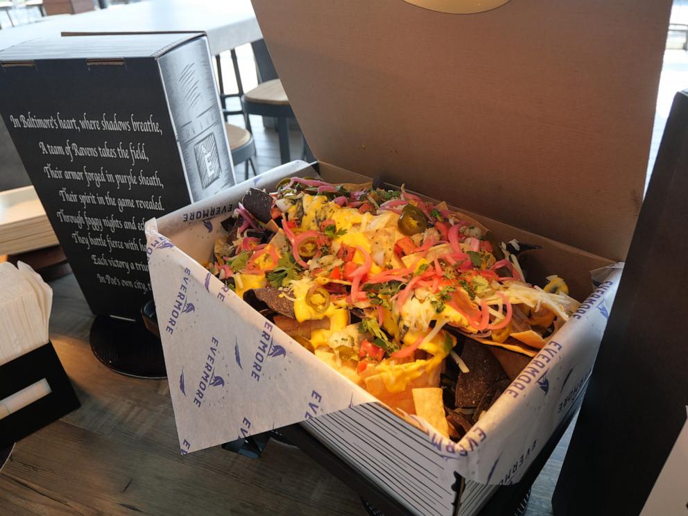 PHOTO: A box of new Evermore Nachos, served in a giant book-shaped box at M&T Bank Stadium.