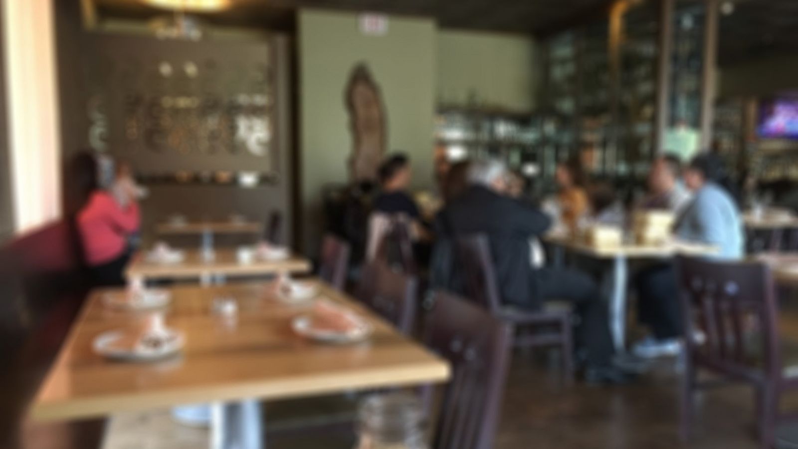 PHOTO: Brandy Ferner snapped this blurry photo in a restaurant to show the "unseen" work mothers do.