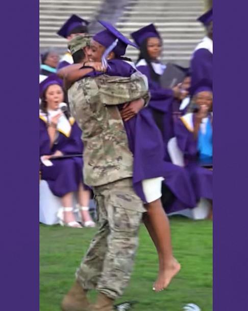 Emotional father-daughter reunion at graduation