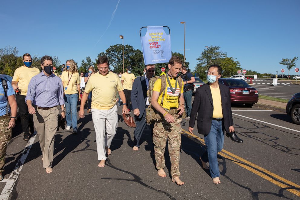 PHOTO: Chris Brannigan, 41, on his current barefoot walk.