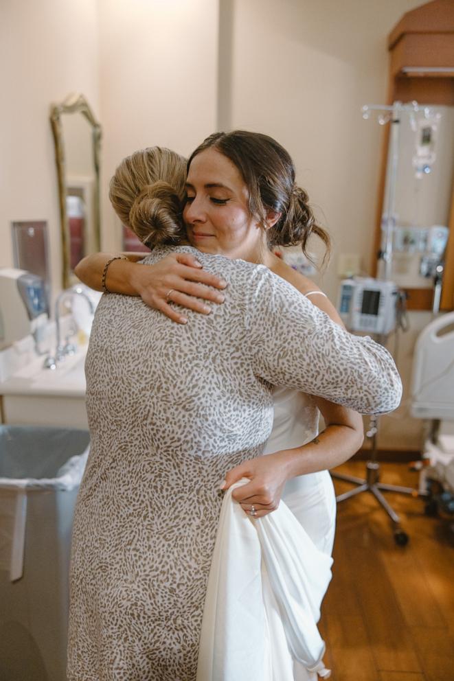 PHOTO: Christine West said she was “shell-shocked” when her close friend Arielle deNeergaard surprised her with a visit at the hospital after she gave birth on the morning of deNeergaard's wedding day.