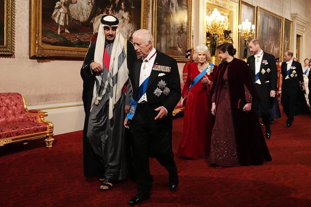 PHOTO: Qatar's Emir Sheikh Tamim bin Hamad al-Thani, Britain's King Charles III, followed by Britain's Queen Camilla and Sheikha Jawaher bint Hamad bin Suhaim al-Thani, arrive for a State Banquet at Buckingham Palace in London, Dec. 3, 2024.