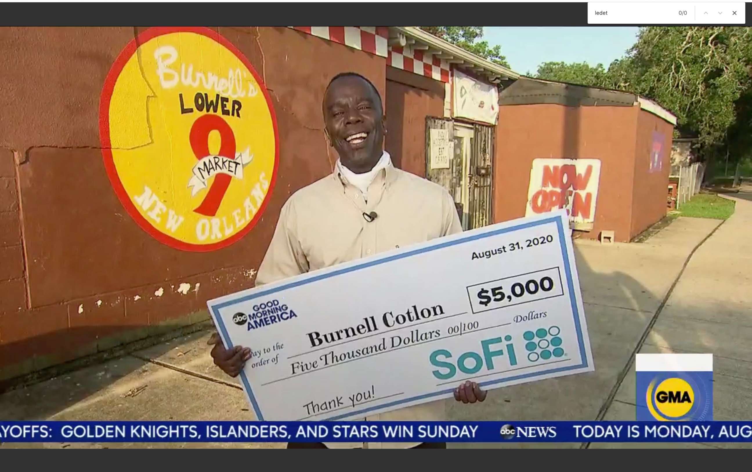 PHOTO: Burnell Cotlon receives a donation live on "Good Morning America" for his grocery store to help residents amid the COVID-19 pandemic pay for groceries. 