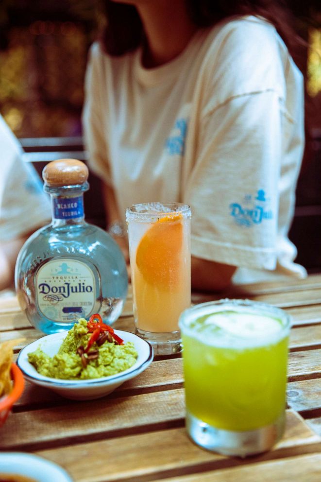 PHOTO: A paloma and other tequila cocktails with a patron wearing the latest This T-Shirt drop.