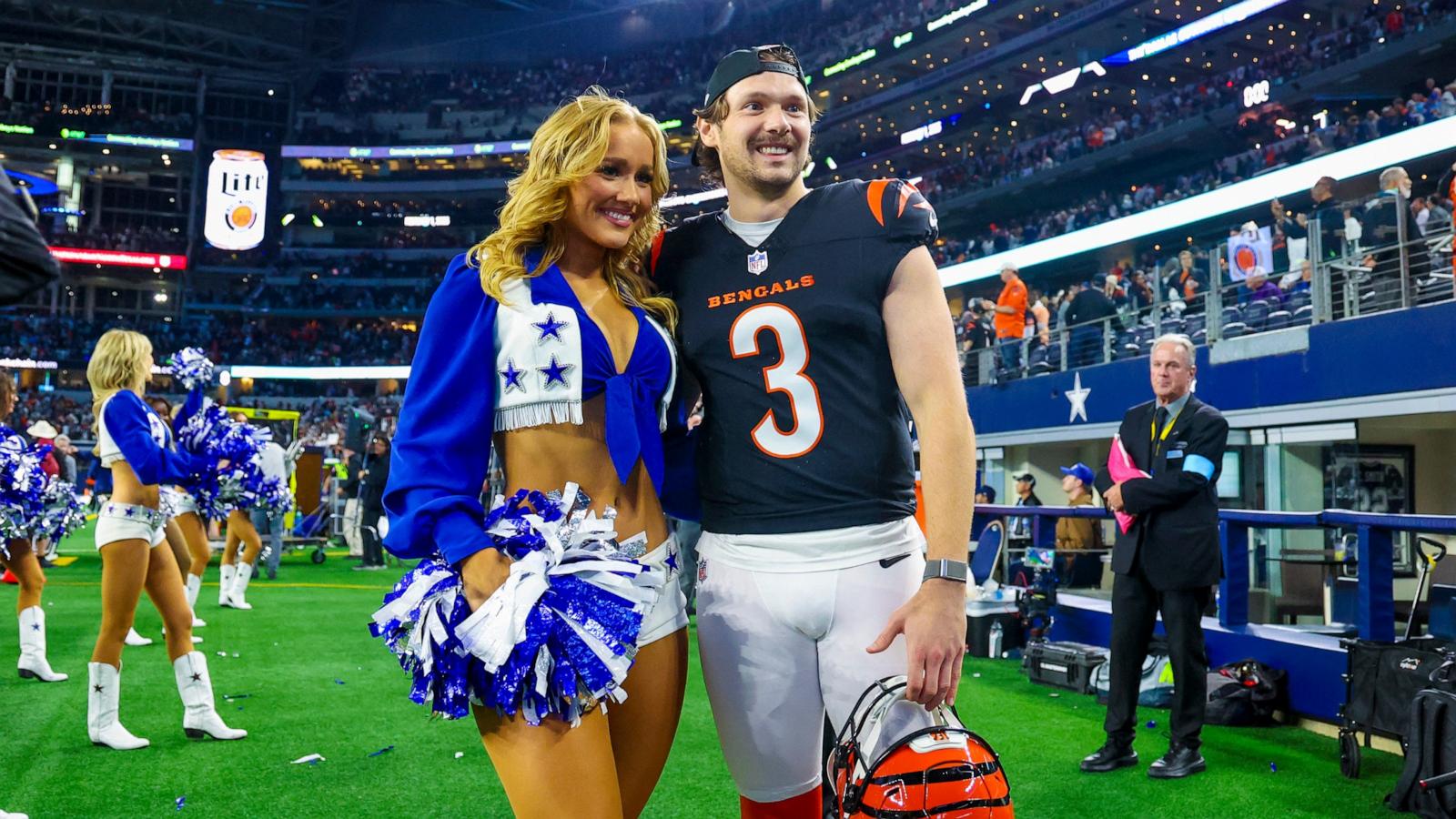 PHOTO: Cincinnati Bengals kicker Cade York takes a photo with his Dallas Cowboys cheerleader girlfriend Zoe Dale after the game against the Dallas Cowboys at AT&T Stadium, Arlington, Tx., Dec. 9, 2024.