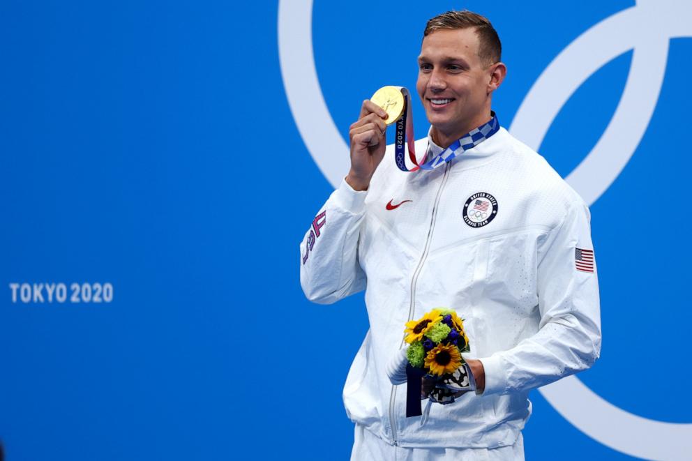 PHOTO: Caeleb Dressel of Team United States poses with the gold medal for the Men's 50m Freestyle Final on day nine of the Tokyo 2020 Olympic Games, Aug. 1, 2021, in Tokyo.