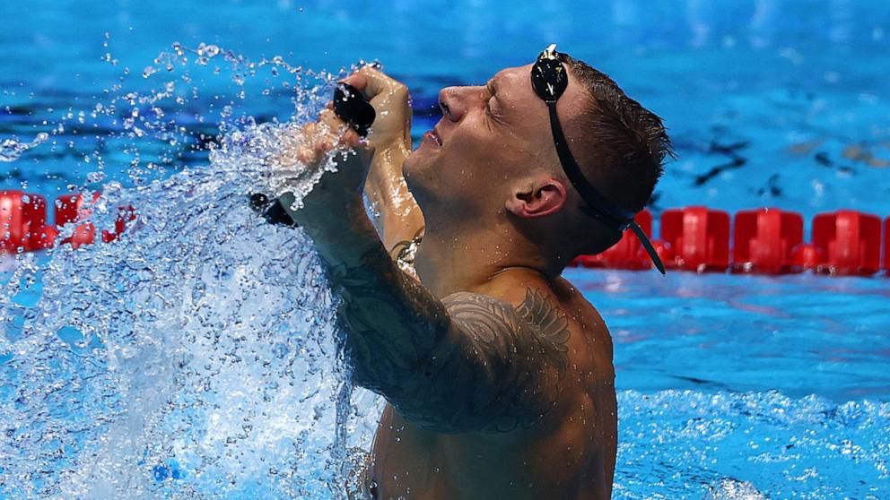 PHOTO: Caeleb Dressel of the United States reacts after winning the Men's 100m butterfly final on Day Eight of the 2024 U.S. Olympic Team Swimming Trials at Lucas Oil Stadium, June 22, 2024, in Indianapolis.