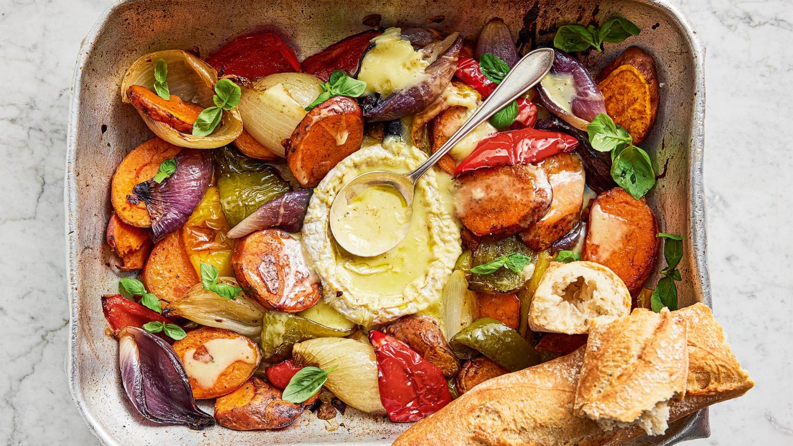 PHOTO: A plate of roasted vegetables and baguette with hot Camembert fondue.