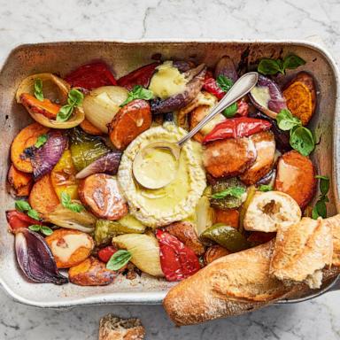 PHOTO: A plate of roasted vegetables and baguette with hot Camembert fondue.