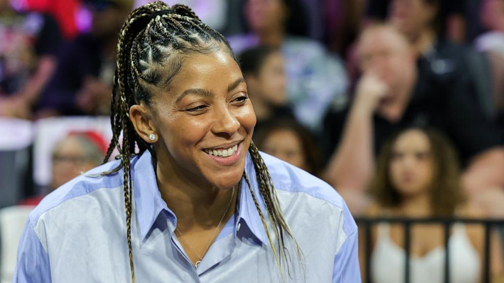 PHOTO: Candace Parker of the Las Vegas Aces looks on from the bench before Game Two of the 2023 WNBA Playoffs finals against the New York Liberty in Las Vegas, NV, Oct. 11, 2023.