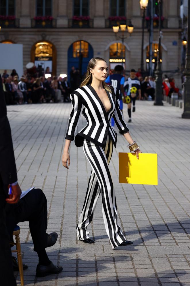 PHOTO: Cara Delevingne walks the runway during Vogue World: Paris at Place Vendome on June 23, 2024 in Paris, France.