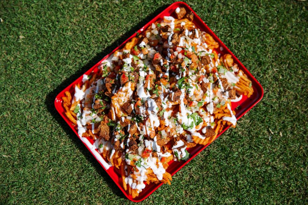 PHOTO: A tray of carne asada topped waffle fries at GEHA Field at Arrowhead Stadium.