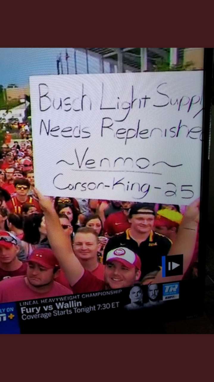 PHOTO: Carson King waved a sign that read "Busch Light Supply Needs Replenished" during ESPN's "College GameDay."