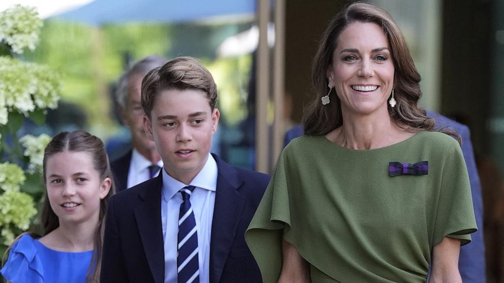 Britain's Catherine, Princess of Wales (R), Britain's Prince George of Wales (C) and Britain's Princess Charlotte of Wales arrive on the last day of the 2026 Wimbledon Championships in Wimbledon, southwest London, on July 12, 2026. 